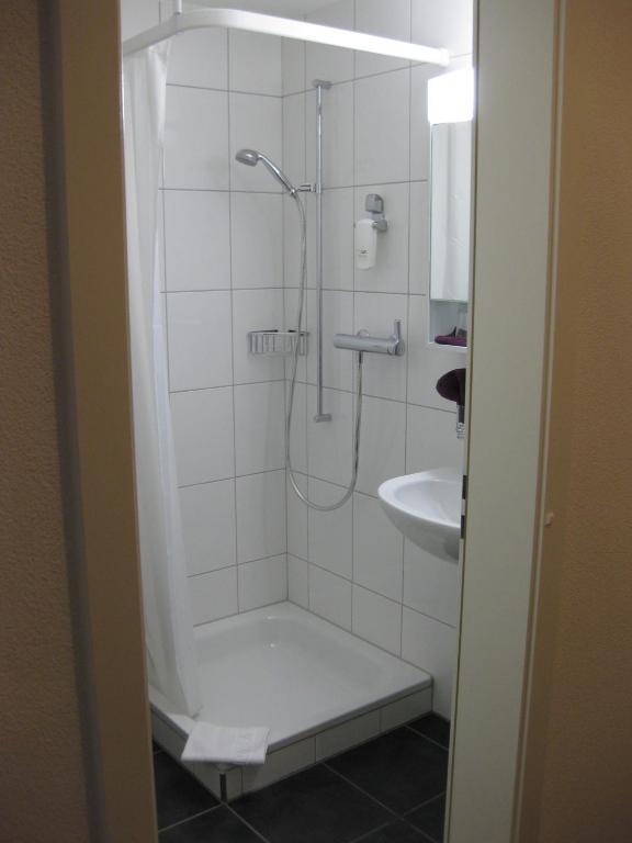 Hotel Restaurant Roessli Uetendorf Szoba fotó